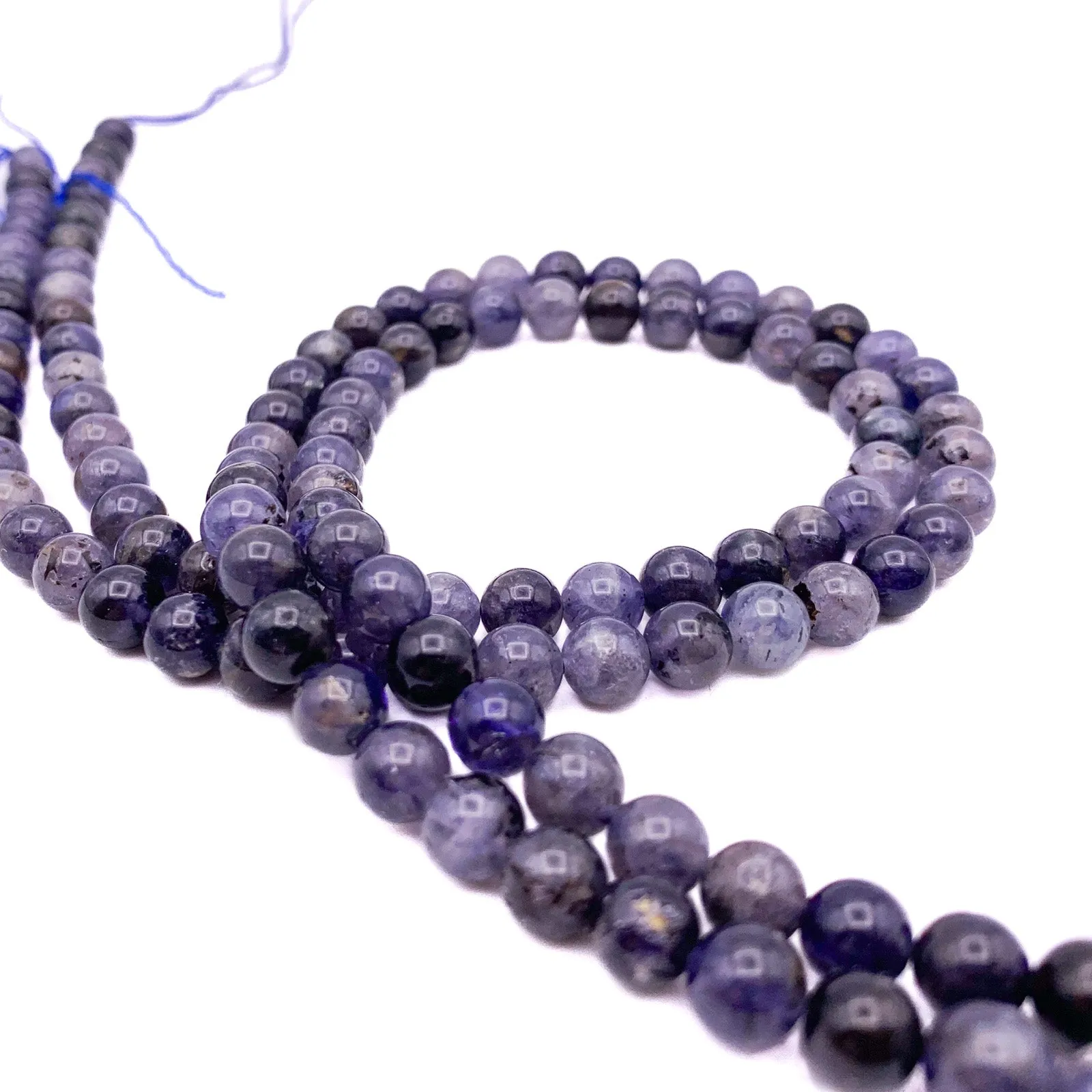 Iolite 6.5mm Smooth Rounds Bead Strand